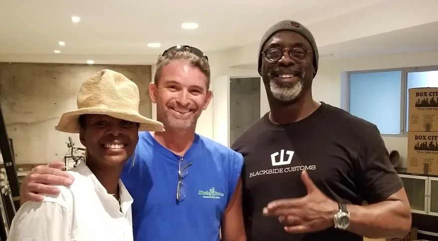 Two delighted customers with their Moving Pro Inc mover