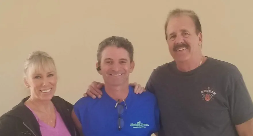 Happy customers with their Moving Pro Inc mover