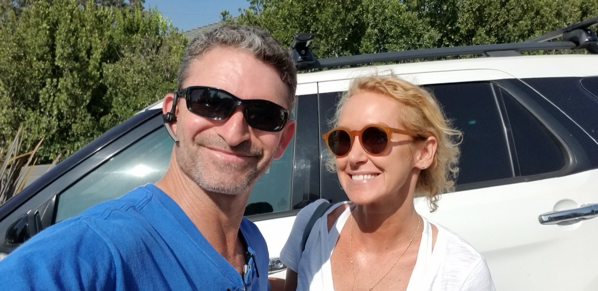 Moving Pro Inc crew and a happy homeowner