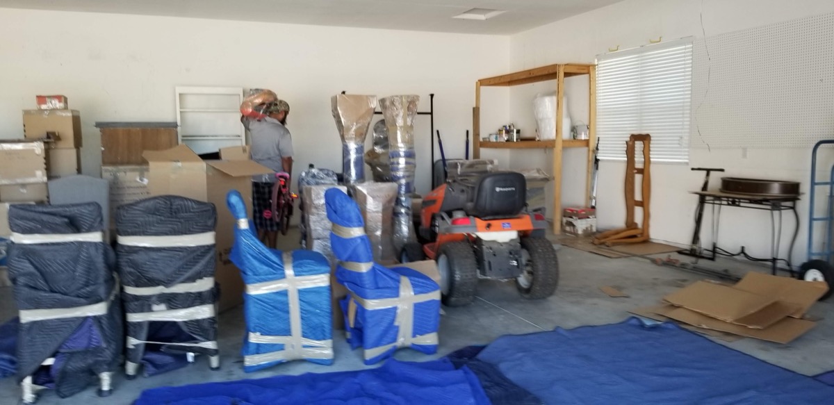 Smiling family with their Moving Pro Inc movers