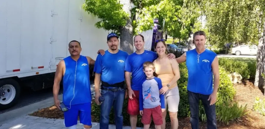 Moving Pro Inc owner Haim with a pleased customer